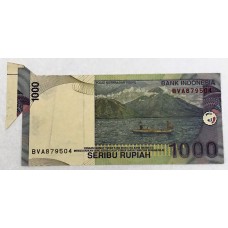 INDONESIA 2000 . ONE THOUSAND 1,000 RUPIAH BANKNOTE . ERROR . LARGE FLAP ON EDGE